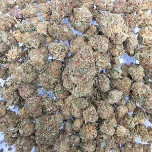 Miracle Alien Cookies (MAC) cannabis flower in a resealable mylar bag